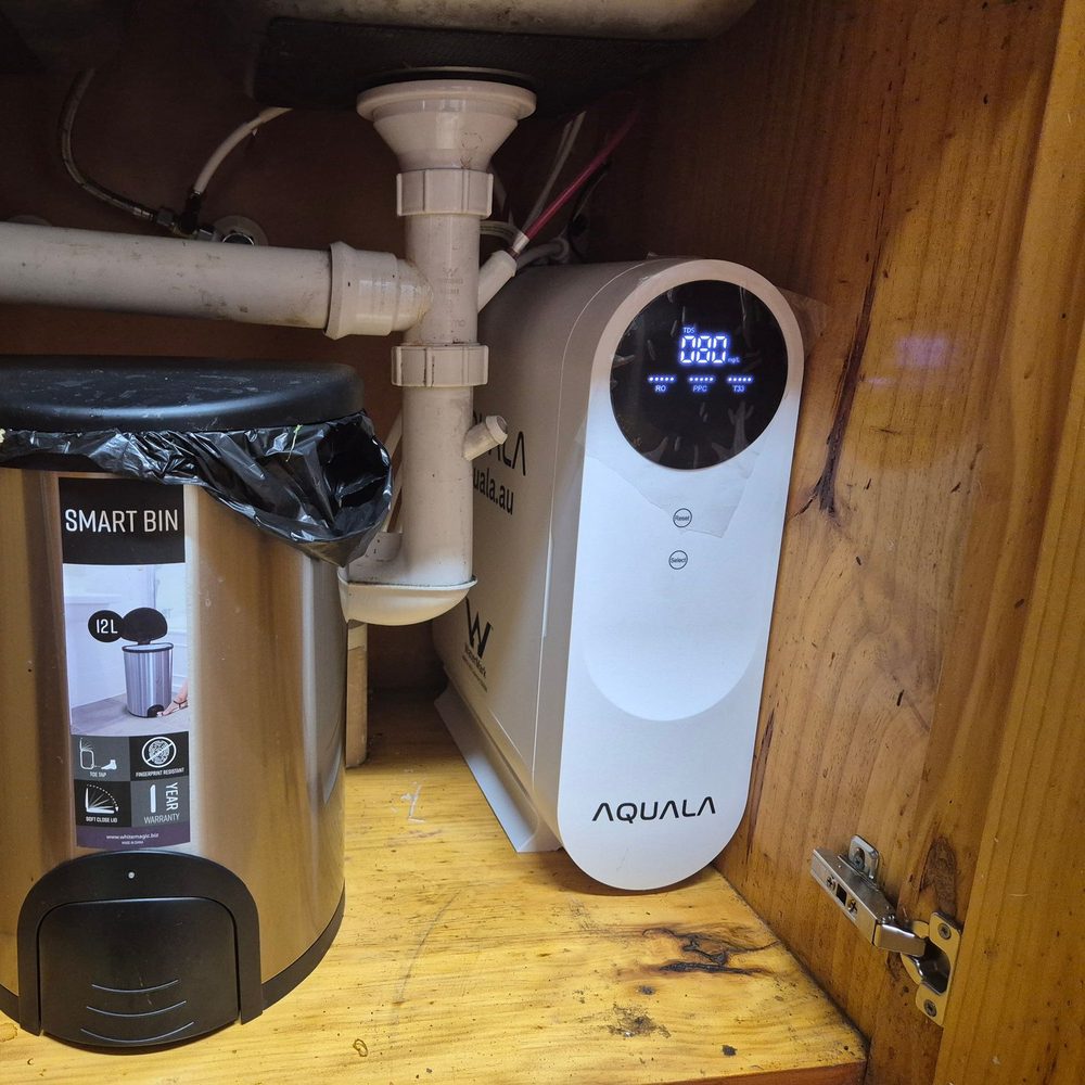 A customer's P500 standing beside a bin and the pipes.