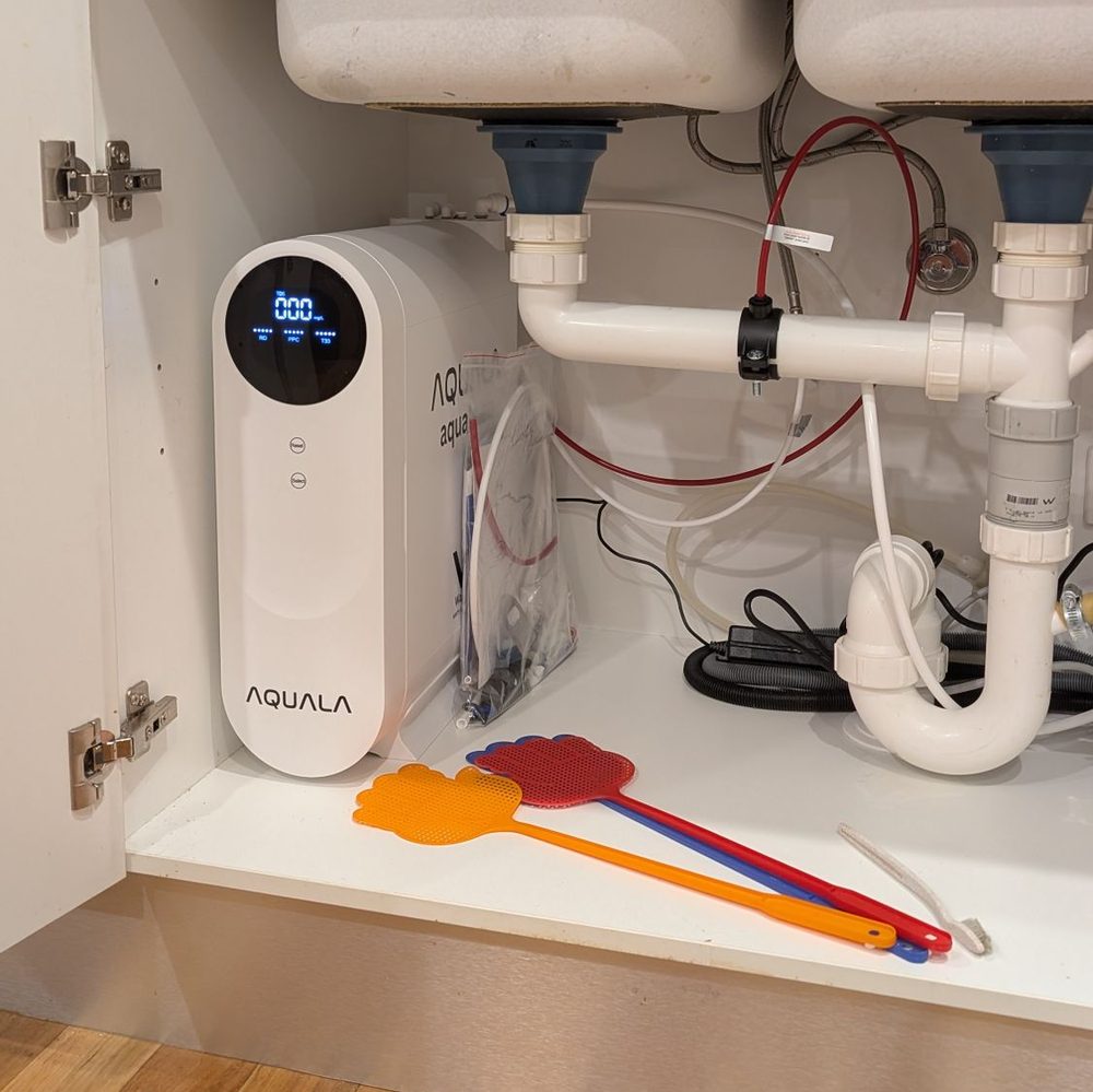 A customer's P500 in a double-sink cupboard.
