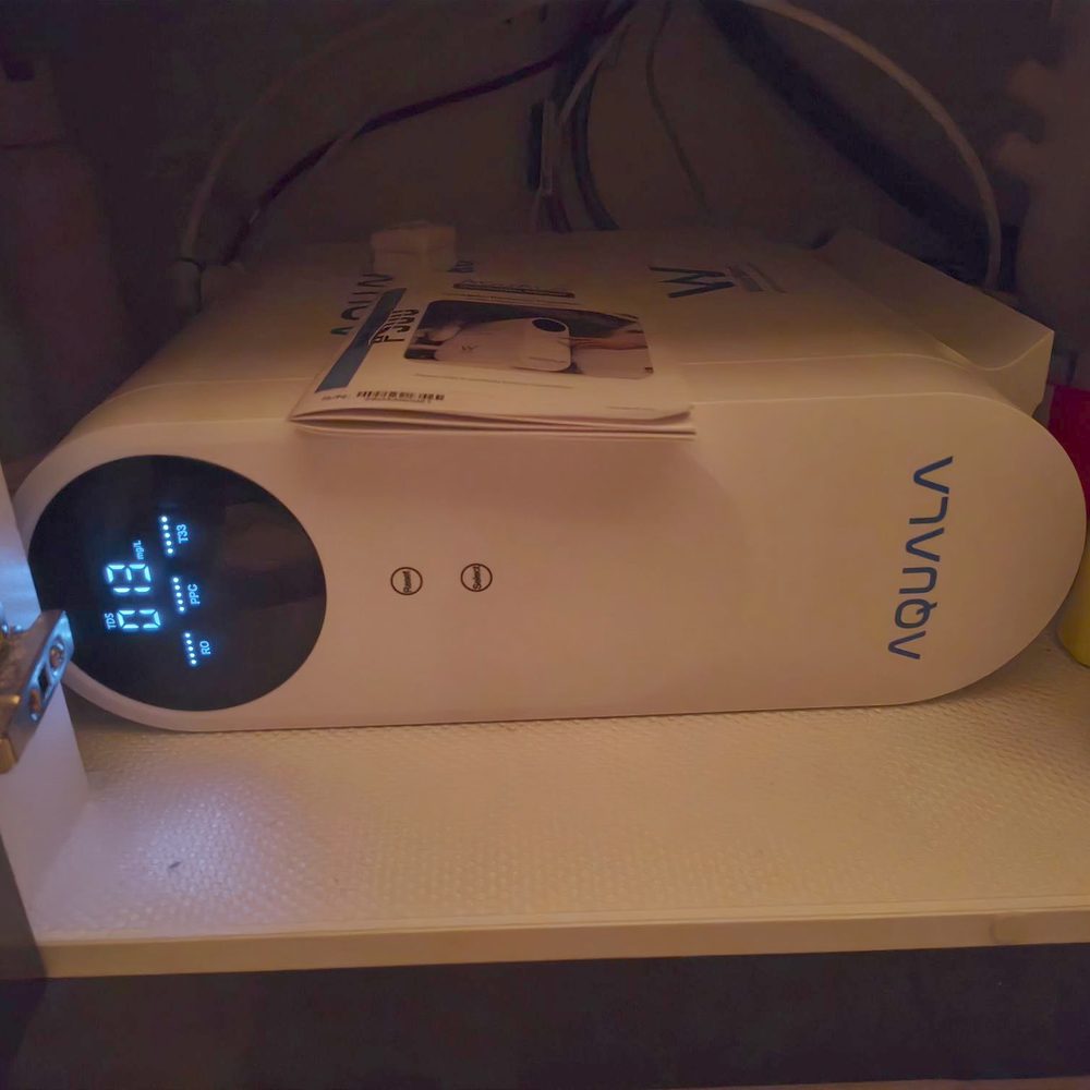 A customer's P500 lying on its side on a low cupboard shelf.